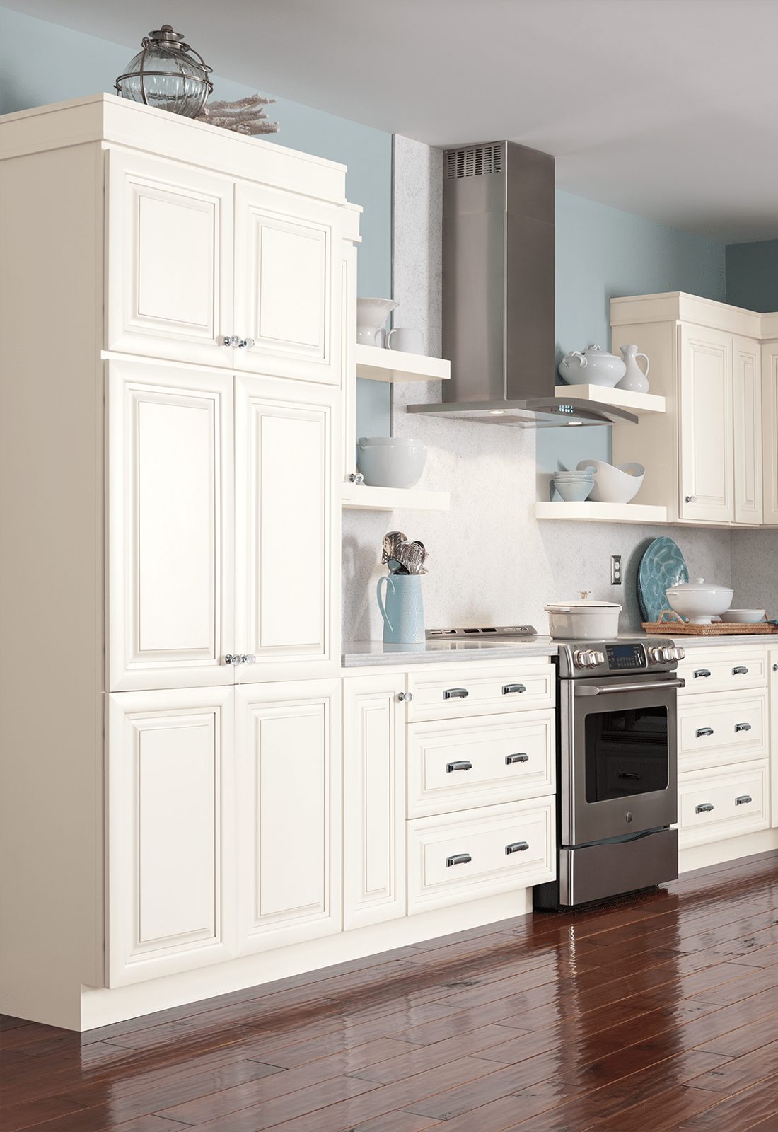 White raised-panel kitchen cabinets with open shelving and a range hood