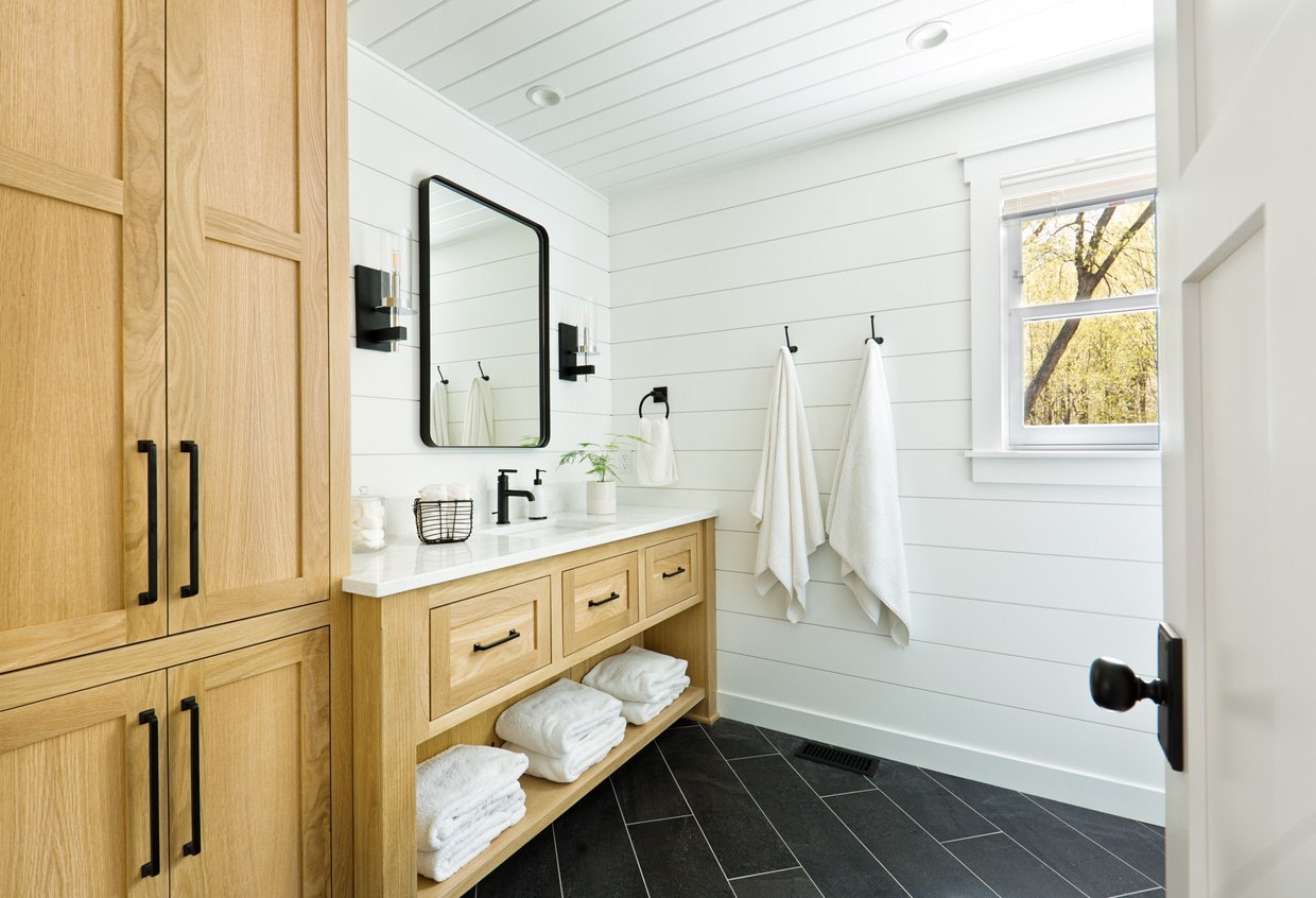 Updated bathroom with freestanding tub and tiled shower