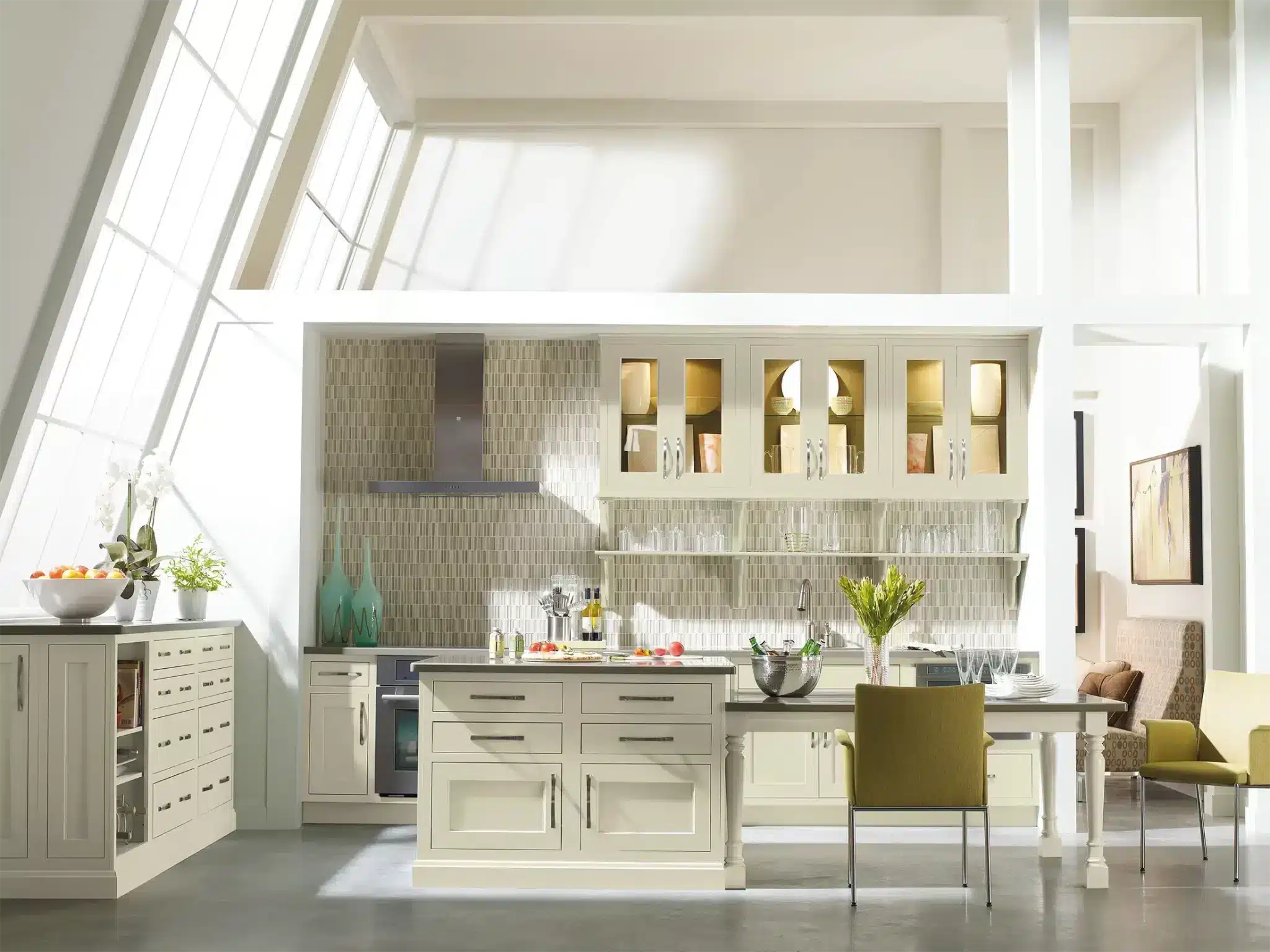 Custom kitchen with cream cabinetry and a tiled backsplash